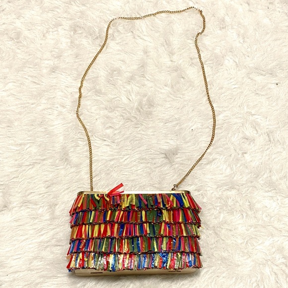 Olga Berg Carlita Carnivale multi-color raffia fringe clutch gold-tone chain.